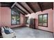 Bright living room with exposed beam ceiling, large windows, and neutral carpeting at 5536 N Camelback Canyon Pl, Phoenix, AZ 85018