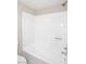 A well-lit shower-tub combination with a white surround in a clean and modern bathroom at 623 W Guadalupe Rd # 279, Mesa, AZ 85210