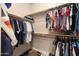 Well-organized walk-in closet offering ample storage space for clothes and accessories at 641 W Mesquite Tree Ln, San Tan Valley, AZ 85143