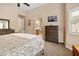 Elegant bedroom with ensuite bathroom and walk-in closet access for added convenience at 641 W Mesquite Tree Ln, San Tan Valley, AZ 85143