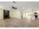 Open-concept living area features tile floors, a fireplace, and seamless access to the updated kitchen at 6821 W Mariposa St, Phoenix, AZ 85033