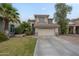 Well maintained two-story home with a two car garage and mature landscaping at 6858 W Potter Dr, Glendale, AZ 85308