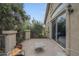 Back patio overlooking mature trees and landscaping at 6858 W Potter Dr, Glendale, AZ 85308