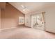 Spacious bedroom featuring bright natural light and vaulted ceilings, with a sliding glass door at 7101 W Beardsley Rd # 1403, Glendale, AZ 85308