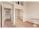 Bright bedroom featuring a closet with mirror doors at 7101 W Beardsley Rd # 1403, Glendale, AZ 85308