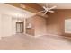 Open-concept living space with dining area, neutral tones, and abundant natural light at 7101 W Beardsley Rd # 1403, Glendale, AZ 85308