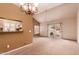 Bright and airy living space with dining area, seamlessly flowing into the kitchen and patio at 7101 W Beardsley Rd # 1403, Glendale, AZ 85308