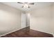 Bedroom with wood floors opens to the hallway at 7516 S 31St Pl, Phoenix, AZ 85042