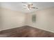 Bright bedroom features ceiling fan, and window at 7516 S 31St Pl, Phoenix, AZ 85042