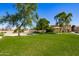 Lush community park featuring mature trees, green grass, and open space for recreation and relaxation in a vibrant setting at 7516 S 31St Pl, Phoenix, AZ 85042
