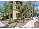 Beautiful exterior of a multi-story condo complex surrounded by lush landscaping at 7601 E Indian Bend Rd # 1050, Scottsdale, AZ 85250