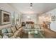 Spacious living room and dining area with large windows and neutral decor at 7601 E Indian Bend Rd # 1050, Scottsdale, AZ 85250