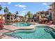 Luxury resort-style swimming pool and lounge area, perfect for relaxation and entertainment in this desert community at 7601 E Indian Bend Rd # 1050, Scottsdale, AZ 85250