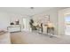 Bright bonus room featuring a functional work space, and cozy sitting area at 8047 W Griswold Rd, Peoria, AZ 85345