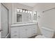 Bright bathroom features single vanity, hard surface countertop, tile flooring and shower/tub combo at 9450 N 94Th Pl # 214, Scottsdale, AZ 85258
