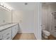 Bright, clean bathroom featuring a vanity, mirror, and a shower/tub combo with tile flooring at 9450 N 94Th Pl # 214, Scottsdale, AZ 85258