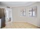 Sunny dining area with tile flooring and multiple windows for natural light at 9450 N 94Th Pl # 214, Scottsdale, AZ 85258