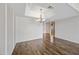 Dining room with hardwood floors and modern chandelier at 9450 N 94Th Pl # 214, Scottsdale, AZ 85258