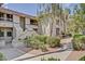 Charming condo featuring well-maintained landscaping, a private balcony, and beautiful Southwestern architecture at 9450 N 94Th Pl # 214, Scottsdale, AZ 85258