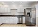 Kitchen featuring white cabinets, stainless steel appliances, and recessed lighting at 9450 N 94Th Pl # 214, Scottsdale, AZ 85258