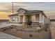 Single-story home with desert landscaping, neutral paint, a tile roof, and attractive curb appeal at 10035 S Palo Verde Dr, Apache Junction, AZ 85120