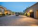 Brick driveway leads to a sprawling estate, complete with multiple garages at 10092 E Troon North Dr, Scottsdale, AZ 85262
