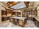 Gourmet kitchen features professional appliances, custom cabinetry, and granite counters at 10092 E Troon North Dr, Scottsdale, AZ 85262