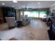 Charming living room offers tile flooring, comfortable seating, and ample natural light at 10229 W Bolivar Dr, Sun City, AZ 85351
