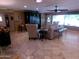 Open living room area featuring comfortable seating and natural light at 10229 W Bolivar Dr, Sun City, AZ 85351