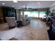 Inviting living room features a neutral color palette, tile flooring, and plenty of natural light at 10229 W Bolivar Dr, Sun City, AZ 85351