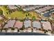Real estate showcasing lush greenbelt views, swimming pool, and well-manicured lawns at 10631 E Tallahassee Ave, Mesa, AZ 85212