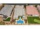 Aerial view of a home with a private pool, spa, putting green, and well-manicured landscaping at 10631 E Tallahassee Ave, Mesa, AZ 85212