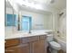Bathroom with vanity, large mirror, shower and tub at 11357 W Buchanan St, Avondale, AZ 85323