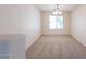Dining area with neutral carpet, white walls, and a window for natural light at 11357 W Buchanan St, Avondale, AZ 85323