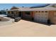 Charming ranch home features solar panels, 2-car garage and unique desert landscaping at 11415 N 110Th Dr, Sun City, AZ 85351