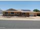 Charming, single story home with a 2-car garage, desert landscaping, and solar panels at 11415 N 110Th Dr, Sun City, AZ 85351