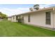 A charming home features a well-maintained lawn and an inviting exterior at 12542 W Parkwood Dr, Sun City West, AZ 85375