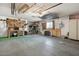 Well-organized garage provides ample workspace and storage solutions at 12542 W Parkwood Dr, Sun City West, AZ 85375