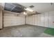 Spacious garage offers ample storage with built-in shelving at 12542 W Parkwood Dr, Sun City West, AZ 85375
