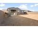 Home with backyard featuring a covered patio and an expansive dirt area awaiting landscaping at 13551 W Calle De Baca --, Peoria, AZ 85383