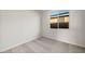 Empty bedroom with new carpet, neutral walls, and window at 13551 W Calle De Baca --, Peoria, AZ 85383