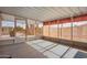 Enclosed sunroom providing an airy space with natural light and views of the outdoor area at 155 E Rodeo Rd # 64, Casa Grande, AZ 85122