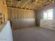Unfinished room with insulation. Ready for paint, flooring, and fixtures at 15788 W Beryl Ave, Waddell, AZ 85355