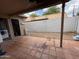 View of the outdoor back patio area, ideal for relaxing or entertaining with brick pavers at 1802 W Frier Dr, Phoenix, AZ 85021