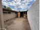 Unfinished backyard offers great potential for customization and personalization of the home at 1802 W Frier Dr, Phoenix, AZ 85021