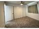 Spacious bedroom with a closet and natural light at 1802 W Frier Dr, Phoenix, AZ 85021
