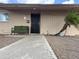 Well-lit front entry with a walkway and security door at 1802 W Frier Dr, Phoenix, AZ 85021