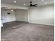Spacious living area with carpet and vinyl flooring and recessed lighting at 1802 W Frier Dr, Phoenix, AZ 85021