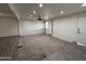 Bright living room with plush carpeting, ceiling fan and ample natural light at 1802 W Frier Dr, Phoenix, AZ 85021