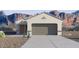 Charming single-story home featuring a spacious two-car garage and desert landscaping against a mountain backdrop at 1811 W Solstice Ave, Apache Junction, AZ 85120